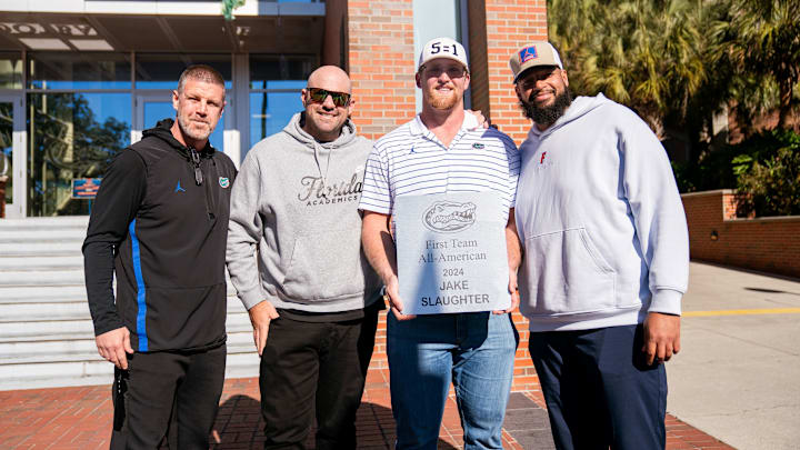 Billy Napier, Rob Sale, Jake Slaughter and Jonathan Decoster pose as Slaughter receives his All-American brick in a ceremony outside of Ben Hill Griffin Stadium. Billy Napier, Rob Sale, Jake Slaughter and Jonathan Decoster pose as Slaughter receives his All-American brick in a ceremony outside of Ben Hill Griffin Stadium.