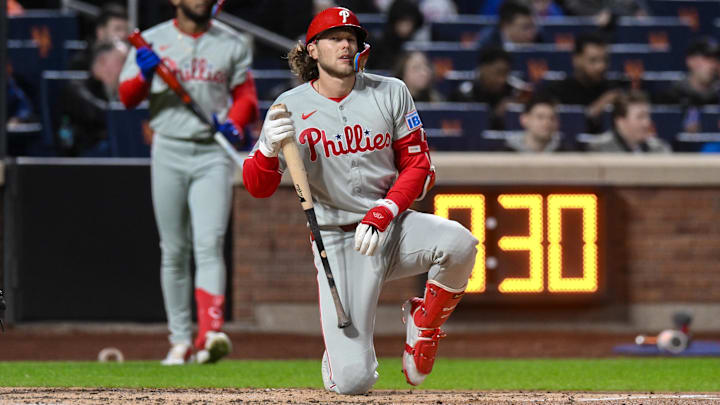 Apr 21, 2025; New York City, New York, USA; Philadelphia Phillies third baseman Alec Bohm (28) reacts after striking out during the third inning against the New York Mets at Citi Field