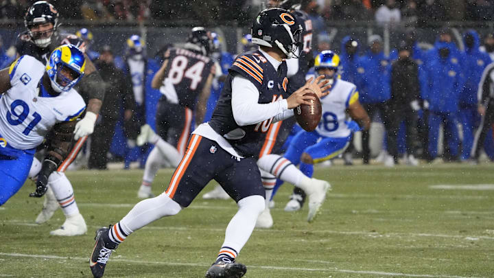 Caleb Williams rolls out looking for a target against the Rams in the playoffs. Out of the pocket and inside it, Williams was better in 2025. Caleb Williams rolls out looking for a target against the Rams in the playoffs. Out of the pocket and inside it, Williams was better in 2025.