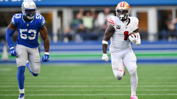 Oct 10, 2024; Seattle, Washington, USA; San Francisco 49ers wide receiver Deebo Samuel Sr. (1) runs away from Seattle Seahawks linebacker Boye Mafe (53) to score a 76-yard touchdown during the first half at Lumen Field. Mandatory Credit: Steven Bisig-Imagn Images Oct 10, 2024; Seattle, Washington, USA; San Francisco 49ers wide receiver Deebo Samuel Sr. (1) runs away from Seattle Seahawks linebacker Boye Mafe (53) to score a 76-yard touchdown during the first half at Lumen Field. Mandatory Credit: Steven Bisig-Imagn Images