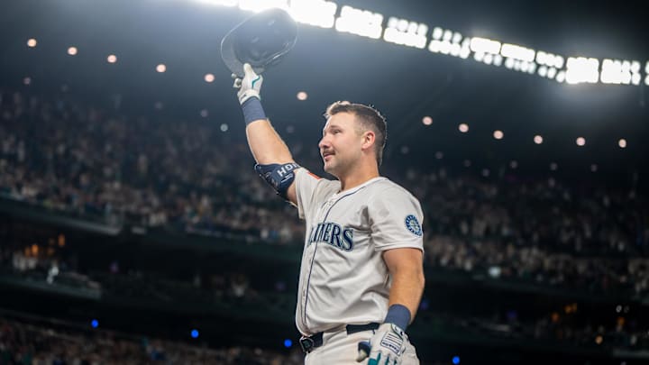 Sep 24, 2025; Seattle, Washington, USA; Seattle Mariners catcher Cal Raleigh (29) acknowledges the crowd after hitting his 60th home run of the season during the eighth inning against the Colorado Rockies at T-Mobile Park. 