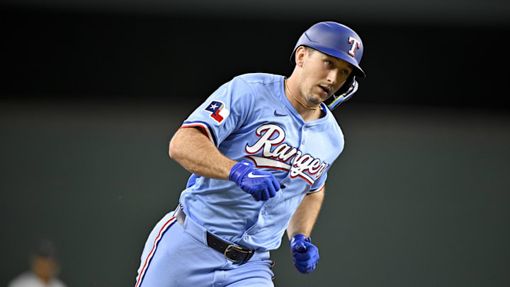 Texas Rangers left fielder Wyatt Langford (36) rounds the bases after he hits a home run against the Miami Marlins during the sixth inning at Globe Life Field. 