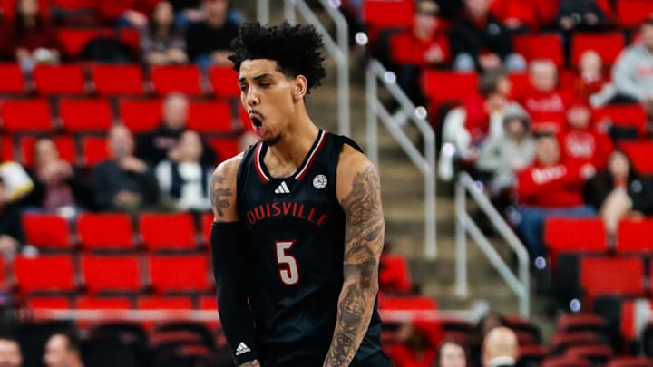 Feb 12, 2025; Raleigh, North Carolina, USA; Louisville Cardinals guard Terrence Edwards Jr. (5) reacts during the first half of the game against the North Carolina State Wolfpack at Lenovo Center. Feb 12, 2025; Raleigh, North Carolina, USA; Louisville Cardinals guard Terrence Edwards Jr. (5) reacts during the first half of the game against the North Carolina State Wolfpack at Lenovo Center.