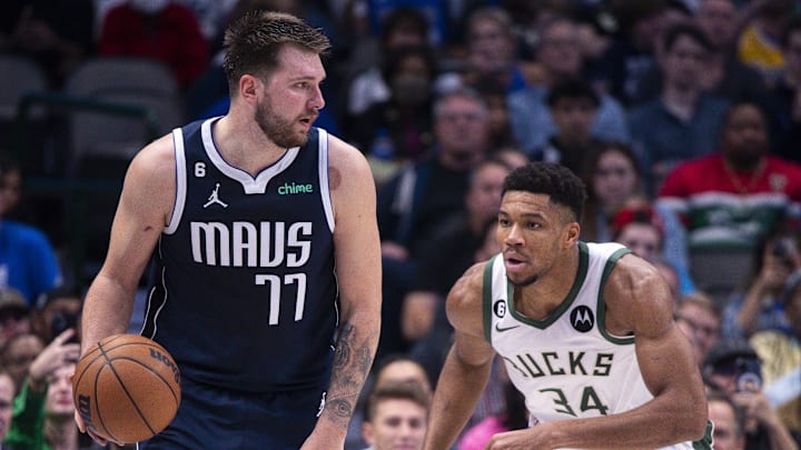 Dec 9, 2022; Dallas, Texas, USA; Dallas Mavericks guard Luka Doncic (77) and Milwaukee Bucks forward Giannis Antetokounmpo (34) in action during the game between the Dallas Mavericks and the Milwaukee Bucks at the American Airlines Center. Mandatory Credit: Jerome Miron-Imagn Images