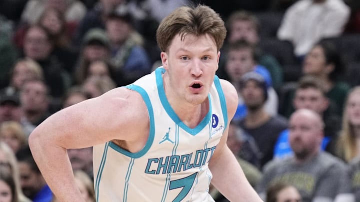 Jan 2, 2026; Milwaukee, Wisconsin, USA; Charlotte Hornets guard Kon Knueppel (7) drives to the basket against the Milwaukee Bucks in the first half at Fiserv Forum. Mandatory Credit: Michael McLoone-Imagn Images