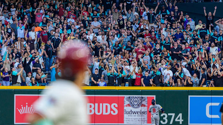 Apr 26, 2025; Phoenix, Arizona, USA;  A general view of Arizona Diamondbacks infielder Eugenio Suarez (28) watching the fans in the outfield react to his home run against the Atlanta Braves in the fourth inning at Chase Field. Mandatory Credit: Allan Henry-Imagn Images