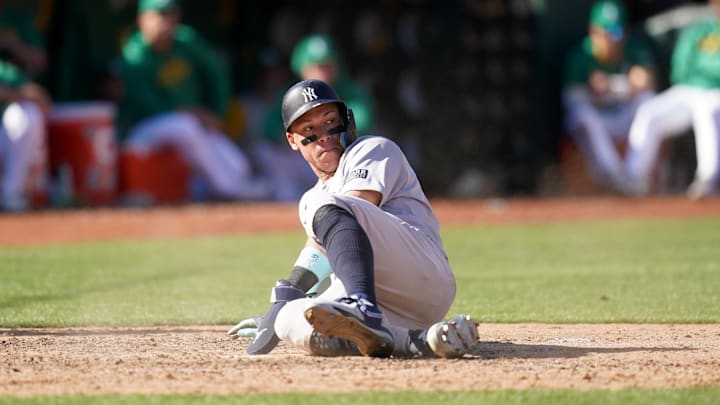 Sep 22, 2024; Oakland, California, USA; New York Yankees center fielder Aaron Judge (99) looks towards first base after being forced out a home plate against the Oakland Athletics in the ninth inning at the Oakland-Alameda County Coliseum. Mandatory Credit: Cary Edmondson-Imagn Images