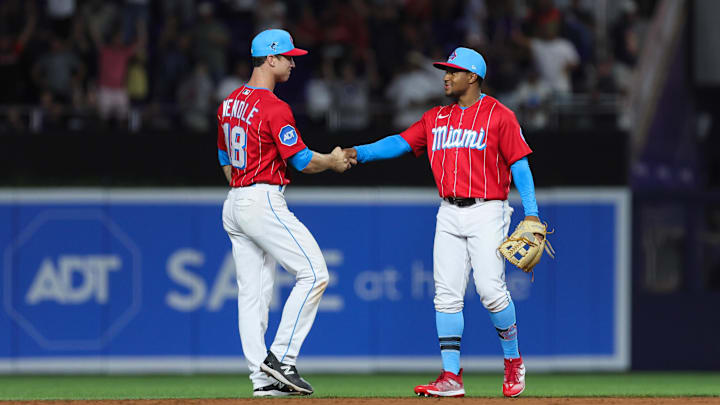 Sep 16, 2023; Miami, Florida, USA; Miami Marlins shortstop Joey Wendle (18) and shortstop Xavier