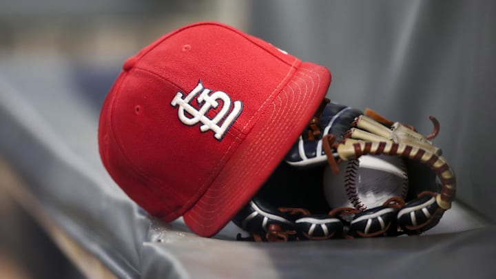 Sep 17, 2018; Atlanta, GA, USA; Detailed view of a St. Louis Cardinals hat and glove in the dugout against the Atlanta Braves in the first inning at SunTrust Park. Mandatory Credit: Brett Davis-Imagn Images
Sep 17, 2018; Atlanta, GA, USA; Detailed view of a St. Louis Cardinals hat and glove in the dugout against the Atlanta Braves in the first inning at SunTrust Park. Mandatory Credit: Brett Davis-Imagn Images