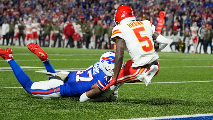 Nov 2, 2025; Orchard Park, New York, USA; Buffalo Bills cornerback Christian Benford (47) brings down Kansas City Chiefs wide receiver Hollywood Brown (5) in the second quarter at Highmark Stadium.