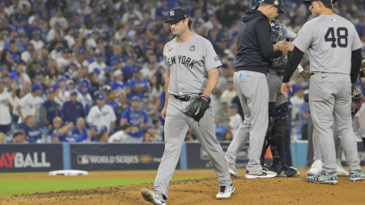 Oct 25, 2024; Los Angeles, California, USA; New York Yankees starting pitcher Gerrit Cole (45) walks to the dugout in the seventh inning against the Los Angeles Dodgers during game one of the 2024 MLB World Series at Dodger Stadium. Mandatory Credit:  Jayne Kamin-Oncea-Imagn Images