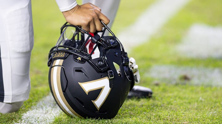 Nov 23, 2024; Baton Rouge, Louisiana, USA; Detailed view of the Vanderbilt Commodores helmet on the turf against the LSU Tigers during the first half at Tiger Stadium. Mandatory Credit: Stephen Lew-Imagn Images Nov 23, 2024; Baton Rouge, Louisiana, USA; Detailed view of the Vanderbilt Commodores helmet on the turf against the LSU Tigers during the first half at Tiger Stadium. Mandatory Credit: Stephen Lew-Imagn Images