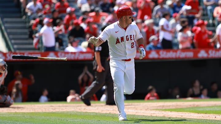 Apr 24, 2024; Anaheim, California, USA;  Los Angeles Angels designated hitter Mike Trout (27) hits a home run during the sixth inning against the Baltimore Orioles at Angel Stadium. Mandatory Credit: Kiyoshi Mio-Imagn Images