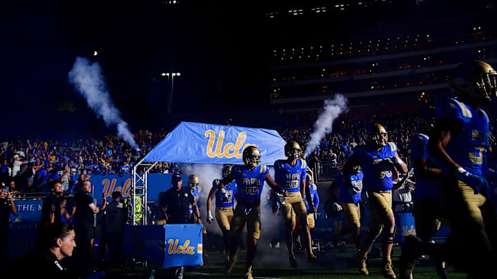 UCLA Bruins are introduced at Rose Bowl. Mandatory Credit: Gary A. Vasquez-Imagn Images