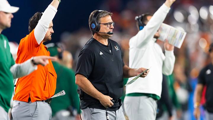 Jan 8, 2026; Glendale, AZ, USA; Miami Hurricanes offensive coordinator Shannon Dawson against the Mississippi Rebels during the 2026 Fiesta Bowl and semifinal game of the College Football Playoff at State Farm Stadium. Mandatory Credit: Mark J. Rebilas-Imagn Images