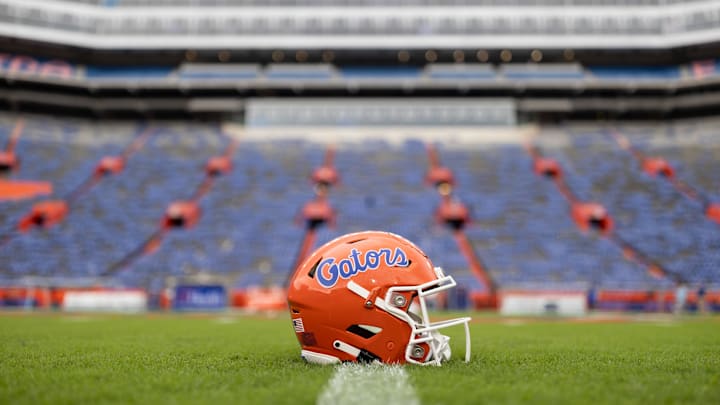 Oct 5, 2024; Gainesville, Florida, USA; A Florida Gators helmet sits on the field before a game against the UCF Knights at Ben Hill Griffin Stadium. Mandatory Credit: Matt Pendleton-Imagn Images Oct 5, 2024; Gainesville, Florida, USA; A Florida Gators helmet sits on the field before a game against the UCF Knights at Ben Hill Griffin Stadium. Mandatory Credit: Matt Pendleton-Imagn Images