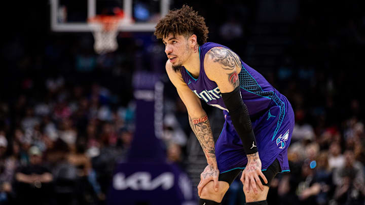 Mar 1, 2025; Charlotte, North Carolina, USA; Charlotte Hornets guard LaMelo Ball (1) looks on during a free throw in the fourth quarter against the Washington Wizards at Spectrum Center. Mandatory Credit: Scott Kinser-Imagn Images