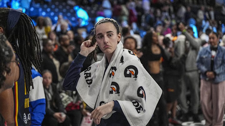 Caitlin Clark leaves the court after the Fever's exhibition win over the Dream.