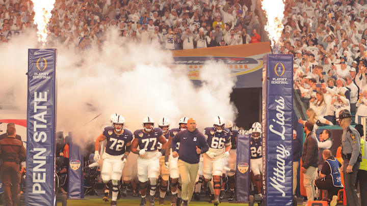 Penn State coach James Franklin leads the Nittany Lions onto the field for the Orange Bowl against Notre Dame.