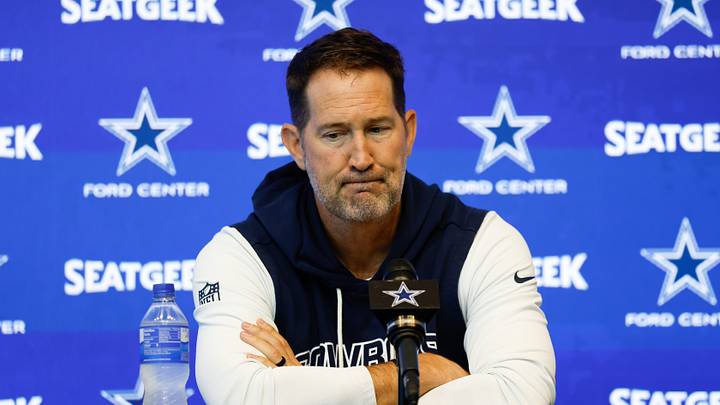 Dallas Cowboys head coach Brian Schottenheimer addresses the media before practice at the Ford Center at the Star Training Facility in Frisco, Texas. Dallas Cowboys head coach Brian Schottenheimer addresses the media before practice at the Ford Center at the Star Training Facility in Frisco, Texas.