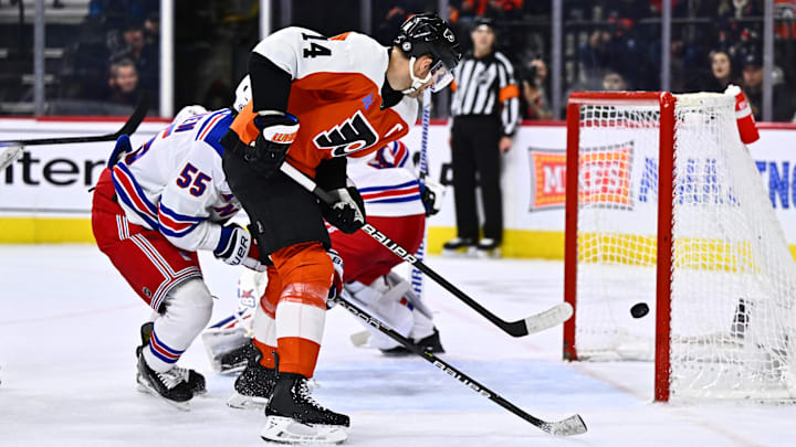 Feb 24, 2024; Philadelphia, Pennsylvania, USA; Philadelphia Flyers center Sean Couturier (14) hits