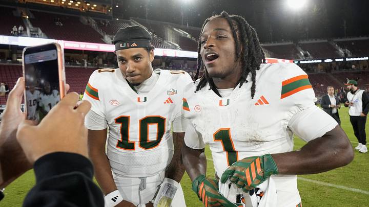 Sep 4, 2026; Stanford, California, USA; Miami Hurricanes quarterback Darian Mensah (10) and wide receiver Malachi Toney (1) on the field after defeating the Stanford Cardinal at Stanford Stadium. Mandatory Credit: Stan Szeto-Imagn Images Sep 4, 2026; Stanford, California, USA; Miami Hurricanes quarterback Darian Mensah (10) and wide receiver Malachi Toney (1) on the field after defeating the Stanford Cardinal at Stanford Stadium. Mandatory Credit: Stan Szeto-Imagn Images