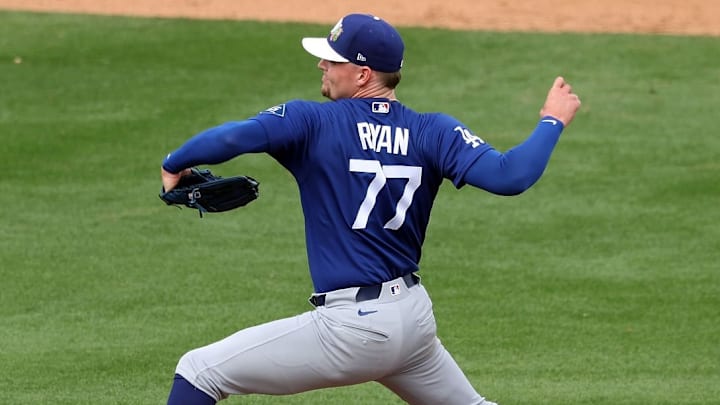 PHOENIX, ARIZONA - MARCH 09: Pitcher River Ryan #77 of the Los Angeles Dodgers throws a pitch against the Milwaukee Brewers during the fifth inning of the spring training game at American Family Fields of Phoenix on March 09, 2026 in Phoenix, Arizona. 
