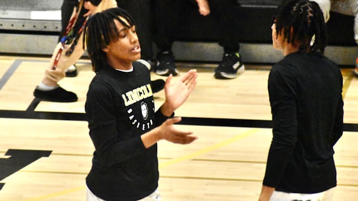 Davion Shareef-Dulaney became the young leader for a state-bound Lincoln of Tacoma squad - and was 3A PSL player of the year as a ninth grader. Davion Shareef-Dulaney became the young leader for a state-bound Lincoln of Tacoma squad - and was 3A PSL player of the year as a ninth grader.