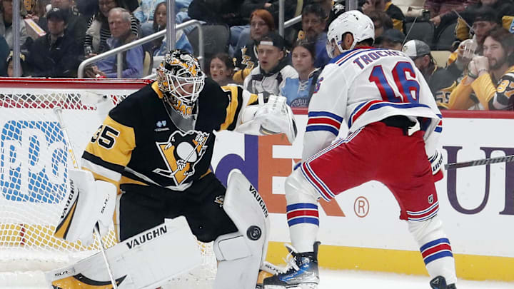 Oct 9, 2024; Pittsburgh, Pennsylvania, USA; Pittsburgh Penguins goaltender Tristan Jarry (35) makes a save against New York Rangers center Vincent Trocheck (16) during the second period at PPG Paints Arena. Mandatory Credit: Charles LeClaire-Imagn Images Oct 9, 2024; Pittsburgh, Pennsylvania, USA; Pittsburgh Penguins goaltender Tristan Jarry (35) makes a save against New York Rangers center Vincent Trocheck (16) during the second period at PPG Paints Arena. Mandatory Credit: Charles LeClaire-Imagn Images