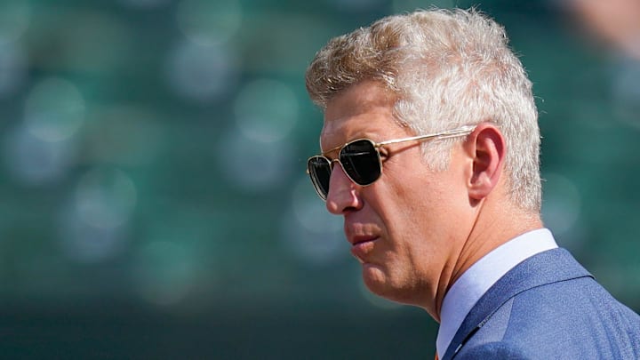 Jul 27, 2022; Baltimore, Maryland, USA; Baltimore Orioles general manager Mike Elias stands oil the field before the game against the Tampa Bay Rays  at Oriole Park at Camden Yards. 
