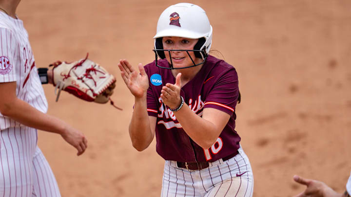 Jordan Lynch claps to energize her team against Alabama. 