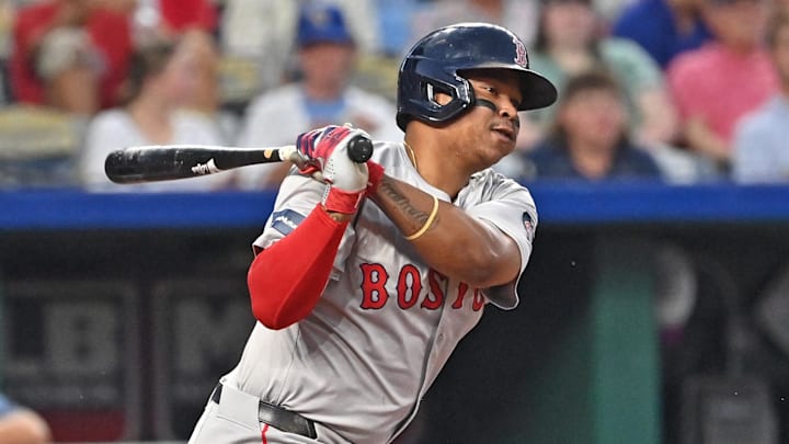 Boston Red Sox third baseman Rafael Devers (11) singles in the fifth inning against the Kansas City Royals at Kauffman Stadium. Boston Red Sox third baseman Rafael Devers (11) singles in the fifth inning against the Kansas City Royals at Kauffman Stadium.