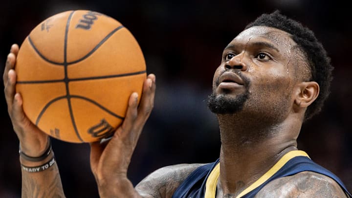 Dec 27, 2025; New Orleans, Louisiana, USA;  New Orleans Pelicans forward Zion Williamson (1) shoots a free throw against the Phoenix Suns against during the second half at Smoothie King Center. Mandatory Credit: Stephen Lew-Imagn Images