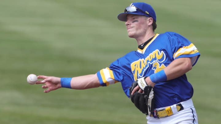 RubberDucks second baseman Travis Bazzana throws to first base to retire an Altoona Curve runner on April 13, 2025, in Akron, Ohio.