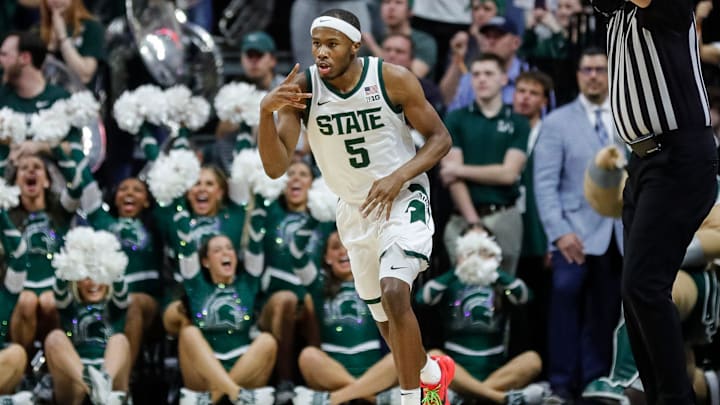 Michigan State guard Tre Holloman (5) celebrates a three point basket against Northwestern during