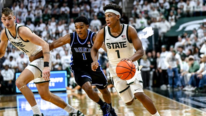 Michigan State's Jeremy Fears Jr., right, moves the ball as Duke's Caleb Foster defends during the second half on Saturday, Dec. 6, 2025, at the Breslin Center in East Lansing. Michigan State's Jeremy Fears Jr., right, moves the ball as Duke's Caleb Foster defends during the second half on Saturday, Dec. 6, 2025, at the Breslin Center in East Lansing.