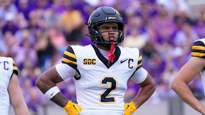 Sep 14, 2024; Greenville, North Carolina, USA; Appalachian State Mountaineers wide receiver Kaedin Robinson (2) looks on against the East Carolina Pirates during the first half at Dowdy-Ficklen Stadium. Mandatory Credit: James Guillory-Imagn Images Sep 14, 2024; Greenville, North Carolina, USA; Appalachian State Mountaineers wide receiver Kaedin Robinson (2) looks on against the East Carolina Pirates during the first half at Dowdy-Ficklen Stadium. Mandatory Credit: James Guillory-Imagn Images
