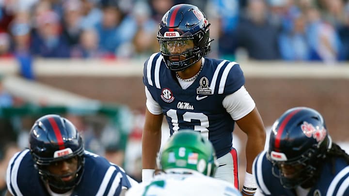 Dec 20, 2025; Oxford, MS, USA; Mississippi Rebels quarterback Austin Simmons (13) waits for the snap during the second quarter against the Tulane Green Wave at Vaught-Hemingway Stadium. Mandatory Credit: Petre Thomas-Imagn Images Dec 20, 2025; Oxford, MS, USA; Mississippi Rebels quarterback Austin Simmons (13) waits for the snap during the second quarter against the Tulane Green Wave at Vaught-Hemingway Stadium. Mandatory Credit: Petre Thomas-Imagn Images