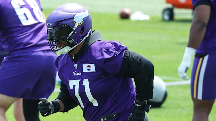 Jun 10, 2025; Minneapolis, MN, USA; Minnesota Vikings offensive tackle Christian Darrisaw (71) practices during minicamp at the Minnesota Vikings Training Facility. Mandatory Credit: Matt Krohn-Imagn Images Jun 10, 2025; Minneapolis, MN, USA; Minnesota Vikings offensive tackle Christian Darrisaw (71) practices during minicamp at the Minnesota Vikings Training Facility. Mandatory Credit: Matt Krohn-Imagn Images