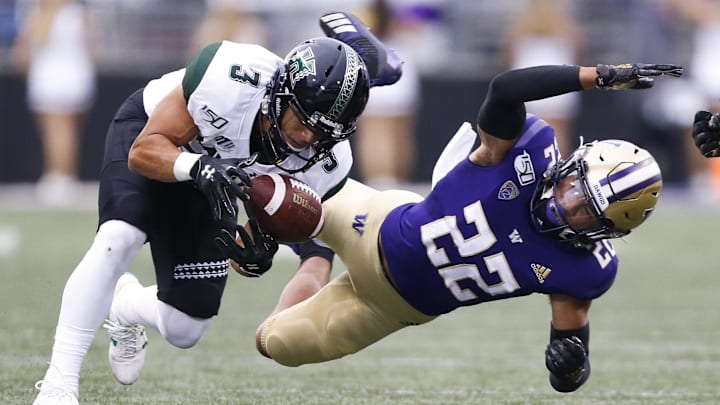 UW corner Trent McDuffie (22) applies tight coverage on Hawaii wide receiver Jason-Matthew Sharsh (3) in 2019. UW corner Trent McDuffie (22) applies tight coverage on Hawaii wide receiver Jason-Matthew Sharsh (3) in 2019.