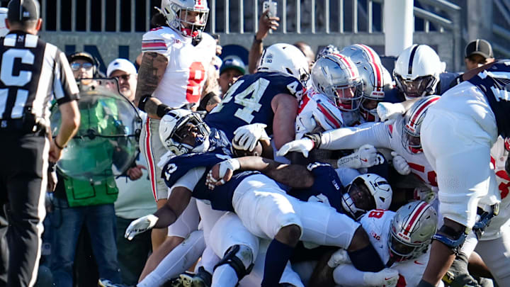 Penn State Nittany Lions running back Kaytron Allen (13) is stopped at the goal line by the Ohio State Buckeyes defense during the second half of the NCAA football game at Beaver Stadium.