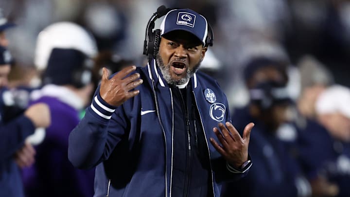 Nov 22, 2025; University Park, Pennsylvania, USA; Penn State Nittany Lions interim head coach Terry Smith reacts from the sideline during the second quarter against the Nebraska Cornhuskers at Beaver Stadium. Mandatory Credit: Matthew O'Haren-Imagn Images