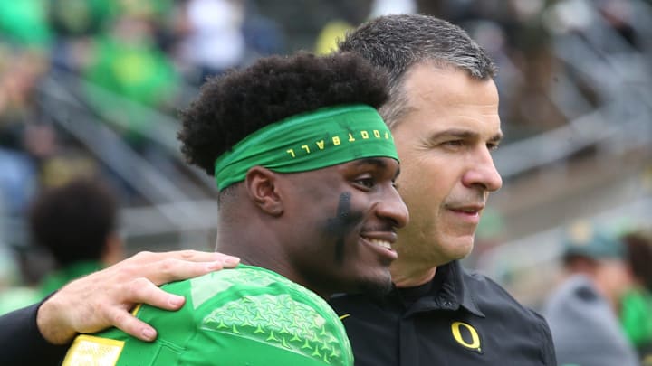 Oregon quarterback Anthony Brown Jr. poses for a photo with he'd coach Mario Cristobal before the game against Oregon State at Autzen.
Eug 111427 Uofb 11 Oregon quarterback Anthony Brown Jr. poses for a photo with he'd coach Mario Cristobal before the game against Oregon State at Autzen.
Eug 111427 Uofb 11
