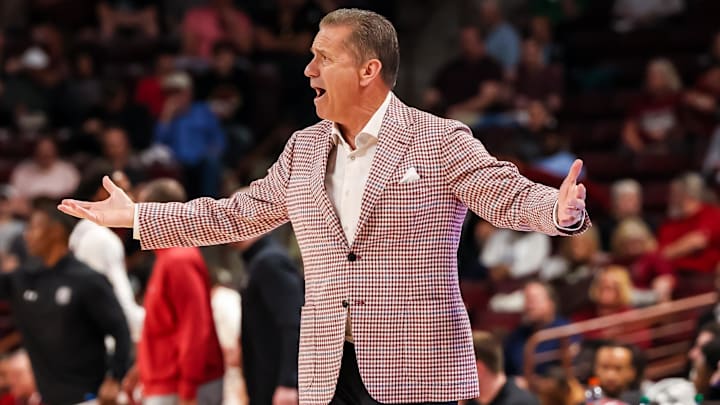 Mar 1, 2025; Columbia, South Carolina, USA; Arkansas Razorbacks head coach John Calipari disputes a call against the South Carolina Gamecocks in the first half at Colonial Life Arena. Mandatory Credit: Jeff Blake-Imagn Images