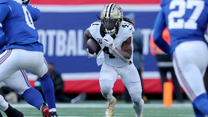 Dec 8, 2024; East Rutherford, New Jersey, USA; New Orleans Saints running back Alvin Kamara (41) runs with the ball against the New York Giants during the second quarter at MetLife Stadium. Mandatory Credit: Brad Penner-Imagn Images Dec 8, 2024; East Rutherford, New Jersey, USA; New Orleans Saints running back Alvin Kamara (41) runs with the ball against the New York Giants during the second quarter at MetLife Stadium. Mandatory Credit: Brad Penner-Imagn Images