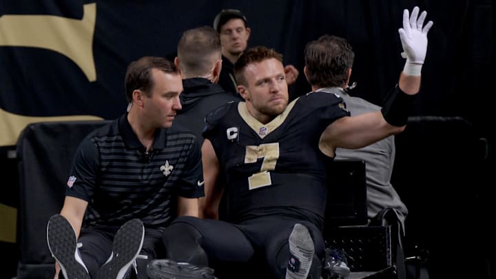 Dec 1, 2024; New Orleans, Louisiana, USA; New Orleans Saints tight end Taysom Hill (7) leaves the field after an injury against the Los Angeles Rams during the second half at Caesars Superdome. Mandatory Credit: Matthew Hinton-Imagn Images Dec 1, 2024; New Orleans, Louisiana, USA; New Orleans Saints tight end Taysom Hill (7) leaves the field after an injury against the Los Angeles Rams during the second half at Caesars Superdome. Mandatory Credit: Matthew Hinton-Imagn Images