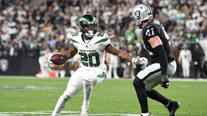 Nov 12, 2023; Paradise, Nevada, USA; New York Jets running back Breece Hall (20) is defended by Las Nov 12, 2023; Paradise, Nevada, USA; New York Jets running back Breece Hall (20) is defended by Las