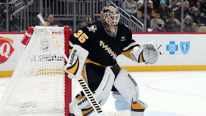 Jan 14, 2025; Pittsburgh, Pennsylvania, USA;  Pittsburgh Penguins goaltender Tristan Jarry (35) guards the net against the Seattle Kraken during the second period at PPG Paints Arena. Mandatory Credit: Charles LeClaire-Imagn Images