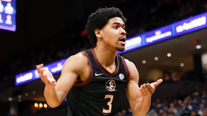 Mar 4, 2025; Charlottesville, Virginia, USA; Florida State Seminoles guard Bostyn Holt (3) talks with the official in the first half against the Virginia Cavaliers at John Paul Jones Arena. Mandatory Credit: Emily Faith Morgan-Imagn Images