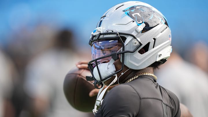 Aug 21, 2025; Charlotte, North Carolina, USA; Carolina Panthers wide receiver Jimmy Horn Jr. (15) throws during pregame warmups against the Pittsburgh Steelers at Bank of America Stadium. 